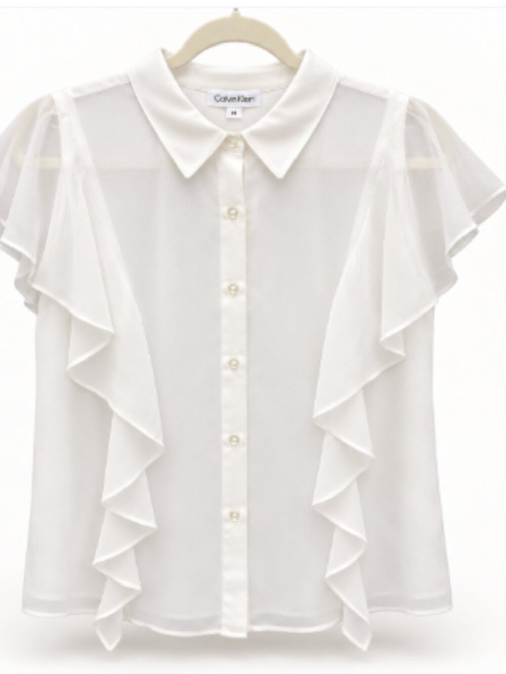New with tags Calvin Klein women’s dressy blouse in Soft White, size Medium.
